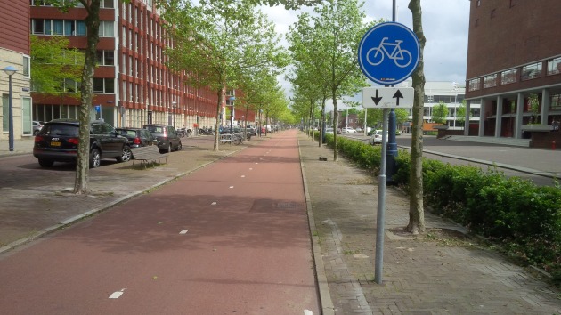 A cycle road, separate to the walkway and the road for vehicles.